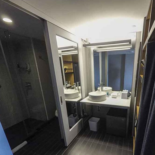 Bath Vanities with Minifridge and Airdryer Hook in Aloft by Marriiott