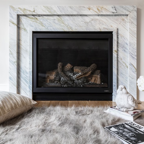Custom fabricate a stone fireplace by choosing a unique slab