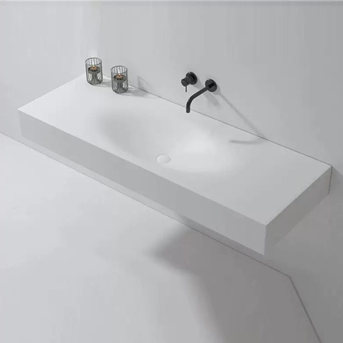 Floating corian bathroom vanity with seamless and integrated sink
