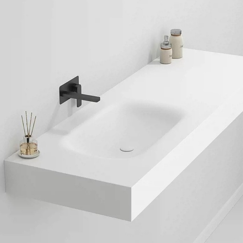 Floating corian bathroom vanity with seamless and integrated sink
