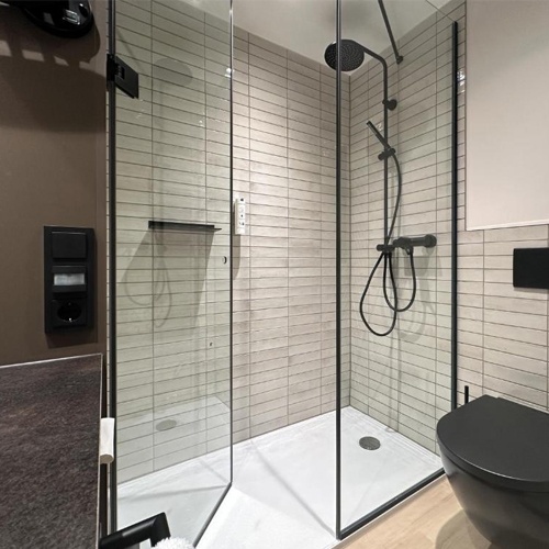 Glass and metal hardware for shower enclosure and door