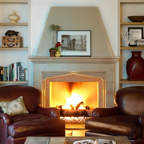 Hotel corner suite living room stone fireplace