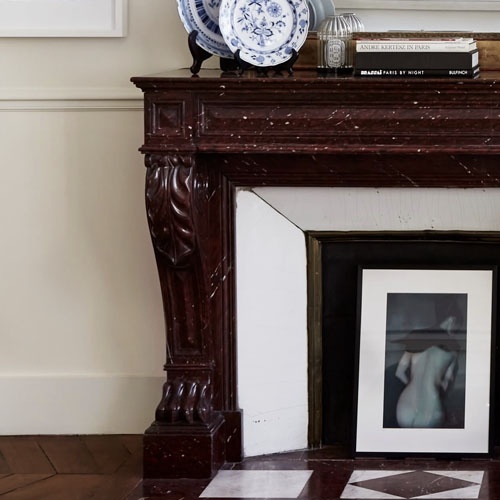 Red marble fireplace mantel