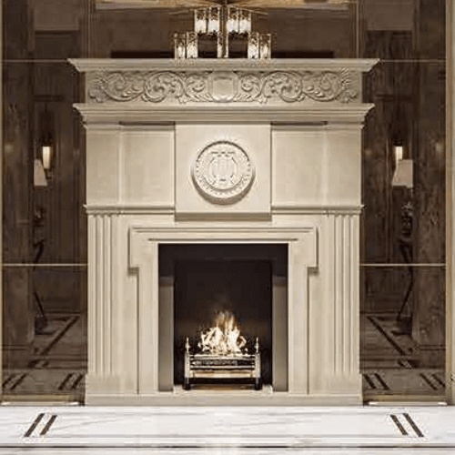 marble fireplace mantel and feature wall in hotel entryhall