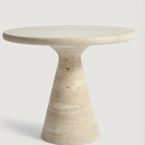monolithic side table is carved from solid Romano Travertine