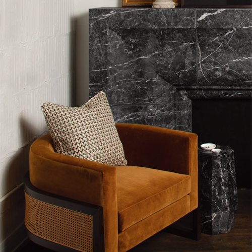 Stylish marble fireplace mantel from interior designer Donna Mondi