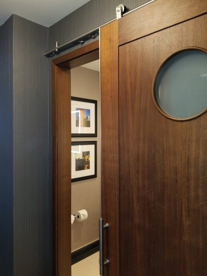 Bathroom barn door in four points hotel by Sheraton