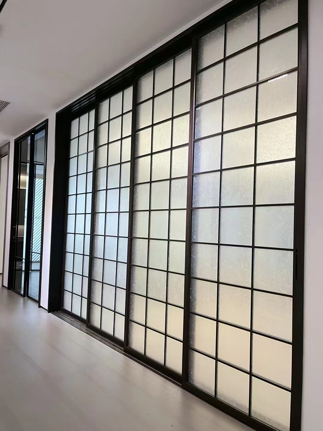Sliding glass door with decorative grid