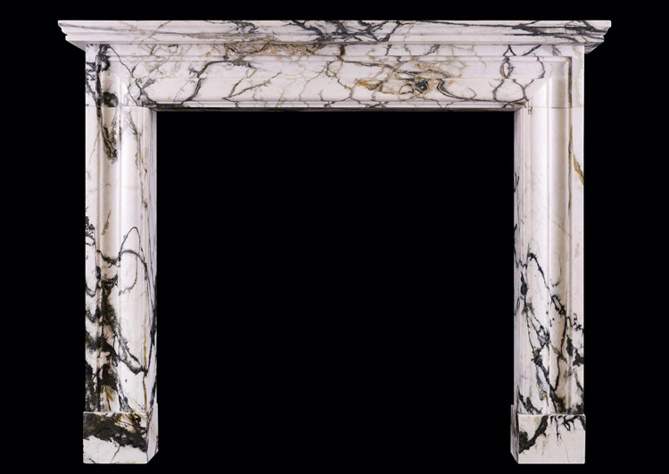 An English moulded bolection fireplace