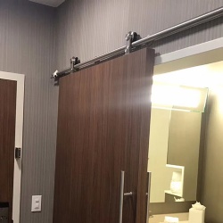 Architectural Flush Sliding Wood Barn Door for Hospitality Properties