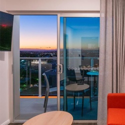 Aluminum glass sliding terrace door in hotel guestroom