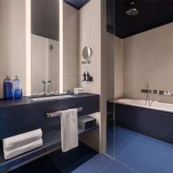 Artificial stone bath vanities and lavatory fixtures in W hotel room
