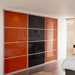 Bedroom closet door by lacquered glass panel
