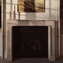 Custom made provincial fireplace surround in beige sandstone