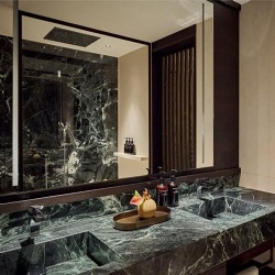 Custom marble Verde Alpi bathroom vanities