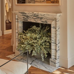 Decorative marble fireplace mantel for retail space
