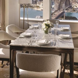 Dining table with marble surface and arm dining chair in Shangri La hotel Sydney