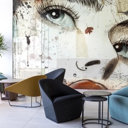 Feature wall with digital printed glass panel in hotel lobby