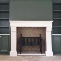 French provincial fireplace surround featured in Belle Magazine