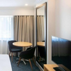Full length wall mirror in IBIS hotel room Sydney