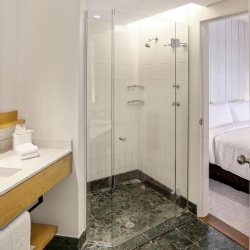 Glass shower door in Shangri-La hotel Cairns