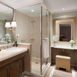 Glass shower enclosure by architectural clear tempered glass in Shangri La hotel Sydney