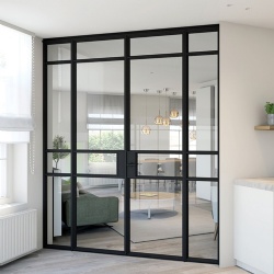 Glass wall in apartment living room with double swinging doors