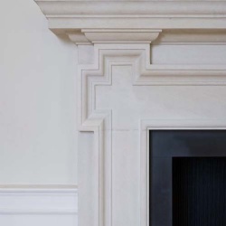 Greek revival limestone fireplace mantel