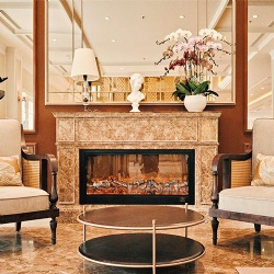 Hospitality Stone Fireplace Surround for Hotel Lounge