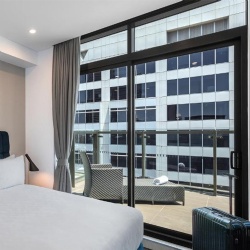 Hotel room sliding aluminum glass door in Meriton Suites Sydney