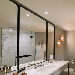 Industrial matte black metal framed vanity mirror