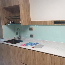 Kitchen wall backsplash with back painted glass