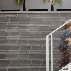 Linear Exterior Wall Cladding by Basalt and Lavastone