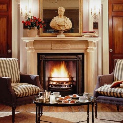 Marble fireplace mantel in Le Dokhan Paris Arc de Triomphe hotel