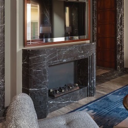 Marble fireplace surround and overmantel mirror