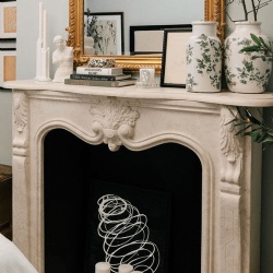 Parisian interior design and decor with classic marble fireplace mantel