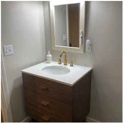 Single bathroom vanity with white quartz top