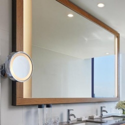 Stained wood frame vanity mirror in hotel Pan Pacific Melbourne
