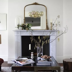Stunning marble fireplace mantel with mirror
