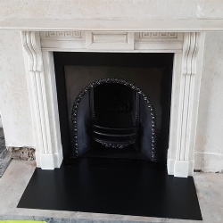 Victorian statuary marble fireplace mantel with Greek key detail on the frieze