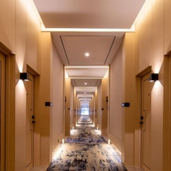 Wall Scone Lighting in Hotel Hallway