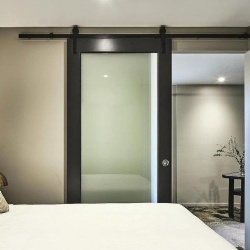 Wood framed glass barn door in Melbourne city apartment hotel