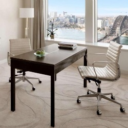 Wooden office table and ergonomic chair in Shangri La hotel Sydney