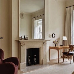 beige marble fireplace mantel