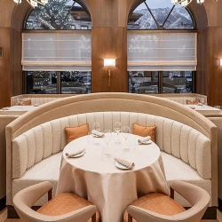 built in banquette seating for boutique hotel dining area