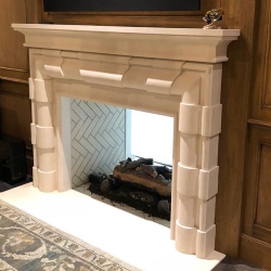 custom limestone fireplace or mantel surround