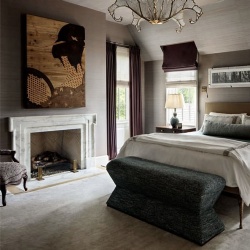 marble fireplace mantel in bedroom