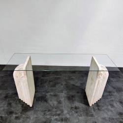 modern table with travertine base and glass top