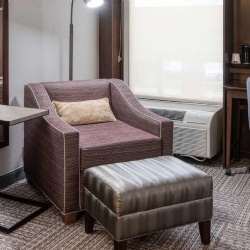 stain‑resistant lounge chair for hotel guestroom
