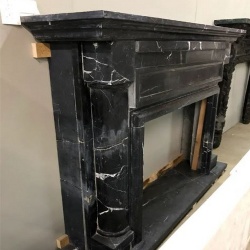 traditional style surround fireplace mantle in nero marquina marble